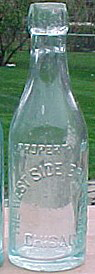 WEST SIDE BREWERY COMPANY EMBOSSED BEER BOTTLE