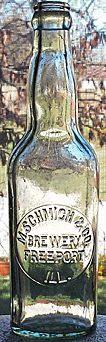 M. SCHMICH & COMPANY BREWERY EMBOSSED BEER BOTTLE