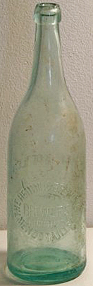 THE HENNING BREWING COMPANY BREWERS EMBOSSED BEER BOTTLE