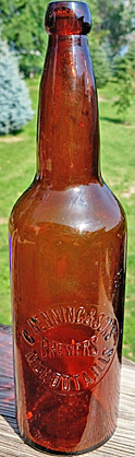 THE HENNING BREWING COMPANY BREWERS EMBOSSED BEER BOTTLE