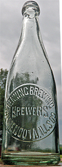 THE HENNING BREWING COMPANY BREWERSEMBOSSED BEER BOTTLE