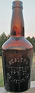 BESELY'S WAUKEGAN BREWING COMPANY EMBOSSED BEER BOTTLE