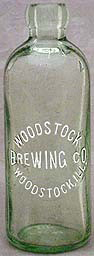 WOODSTOCK BREWING COMPANY EMBOSSED BEER BOTTLE