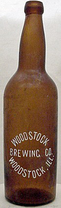 WOODSTOCK BREWING COMPANY EMBOSSED BEER BOTTLE