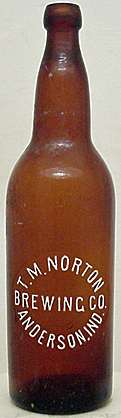 T. M. NORTON BREWING COMPANY EMBOSSED BEER BOTTLE