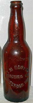 T. M. NORTON BREWING COMPANY EMBOSSED BEER BOTTLE