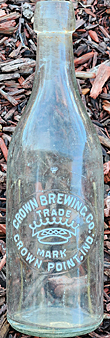 CROWN BREWING COMPANY EMBOSSED BEER BOTTLE