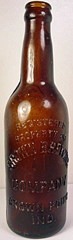 CROWN BREWING COMPANY EMBOSSED BEER BOTTLE