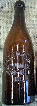 F. W. COOK BREWING COMPANY EMBOSSED BEER BOTTLE