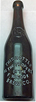 F. W. COOK BREWING COMPANY EMBOSSED BEER BOTTLE