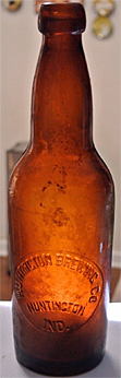 HUNTINGTON BREWING COMPANY EMBOSSED BEER BOTTLE