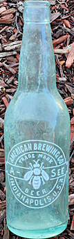 AMERICAN BREWING COMPANY EMBOSSED BEER BOTTLE