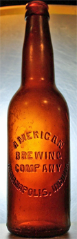 AMERICAN BREWING COMPANY EMBOSSED BEER BOTTLE