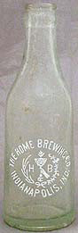 THE HOME BREWING COMPANY EMBOSSED BEER BOTTLE