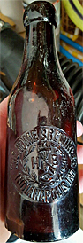 THE HOME BREWING COMPANY EMBOSSED BEER BOTTLE