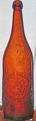 THE HOME BREWING COMPANY EMBOSSED BEER BOTTLE