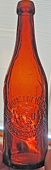 THE HOME BREWING COMPANY EMBOSSED BEER BOTTLE