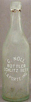 SCHLITZ BEER EMBOSSED BEER BOTTLE