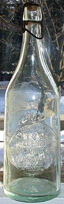 THE KAMM & SCHELLINGER BREWING COMPANY EMBOSSED BEER BOTTLE