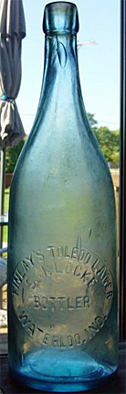 FINLAY'S TOLEDO LAGER EMBOSSED BEER BOTTLE