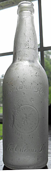 AMERICAN BREWING COMPANY EMBOSSED BEER BOTTLE