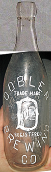 DOBLER BREWING COMPANY EMBOSSED BEER BOTTLE