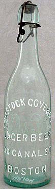 COMSTOCK GOVE & COMPANY LAGER BEER EMBOSSED BEER BOTTLE