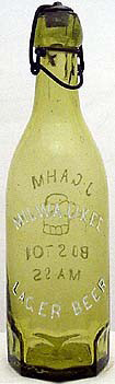 MILWAUKEE LAGER BEER EMBOSSED BEER BOTTLE