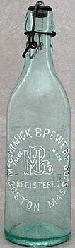 MCCORMICK BREWERY COMPANY EMBOSSED BEER BOTTLE