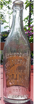 THE ROESSLE BREWERY EMBOSSED BEER BOTTLE