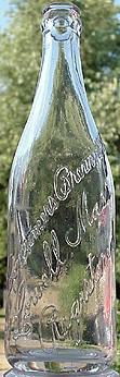 CONSUMERS BREWING COMPANY EMBOSSED BEER BOTTLE