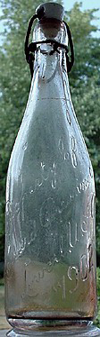 HARVARD BREWING COMPANY EMBOSSED BEER BOTTLE