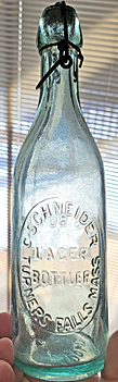 C. SCHNEIDER LAGER BOTTLER EMBOSSED BEER BOTTLE