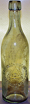 THE GEORGE BAUERNSCHMIDT BREWING COMPANY EMBOSSED BEER BOTTLE