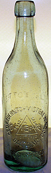 THE GEORGE BAUERNSCHMIDT BREWING COMPANY EMBOSSED BEER BOTTLE