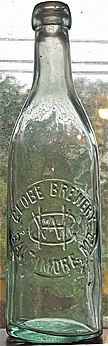 THE GLOBE BREWERY EMBOSSED BEER BOTTLE