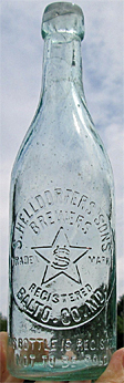 S. HELLDORFER'S SONS BREWERS EMBOSSED BEER BOTTLE