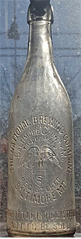 THE NATIONAL BREWING COMPANY EMBOSSED BEER BOTTLE