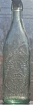 THE NATIONAL BREWING COMPANY EMBOSSED BEER BOTTLE