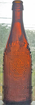 THE ADAM SCHEIDT BREWING COMPANY EMBOSSED BEER BOTTLE