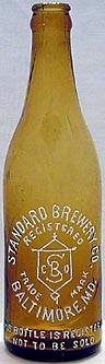 THE STANDARD BREWERY COMPANY EMBOSSED BEER BOTTLE