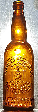 THE STANDARD BREWERY COMPANY EMBOSSED BEER BOTTLE