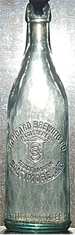 THE STANDARD BREWING COMPANY EMBOSSED BEER BOTTLE