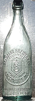 THE STANDARD BREWERY COMPANY EMBOSSED BEER BOTTLE