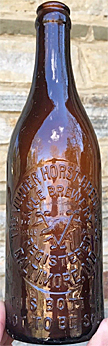 THE VON DER HORST BREWING COMPANY EAGLE BREWERY EMBOSSED BEER BOTTLE