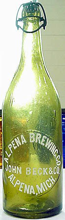 ALPENA BREWING COMPANY EMBOSSED BEER BOTTLE