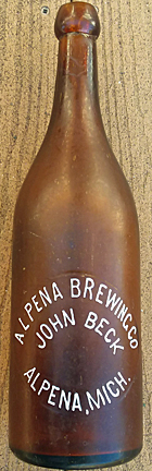 ALPENA BREWING COMPANY EMBOSSED BEER BOTTLE