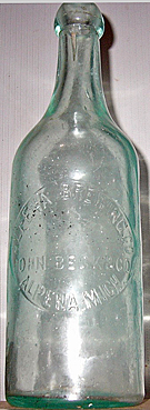 ALPENA BREWING COMPANY EMBOSSED BEER BOTTLE