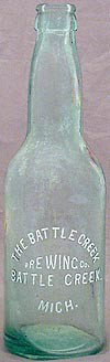 THE BATTLE CREEK BREWING COMPANY EMBOSSED BEER BOTTLE