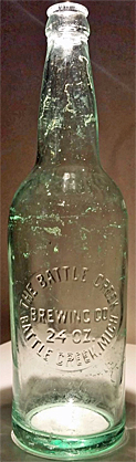 THE BATTLE CREEK BREWING COMPANY EMBOSSED BEER BOTTLE